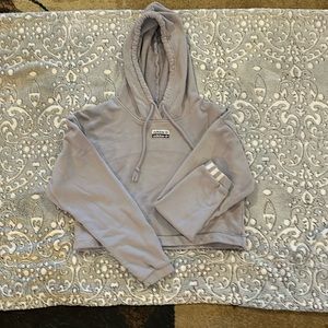 Women’s Adidas cropped sweatshirt, color is glory gray.